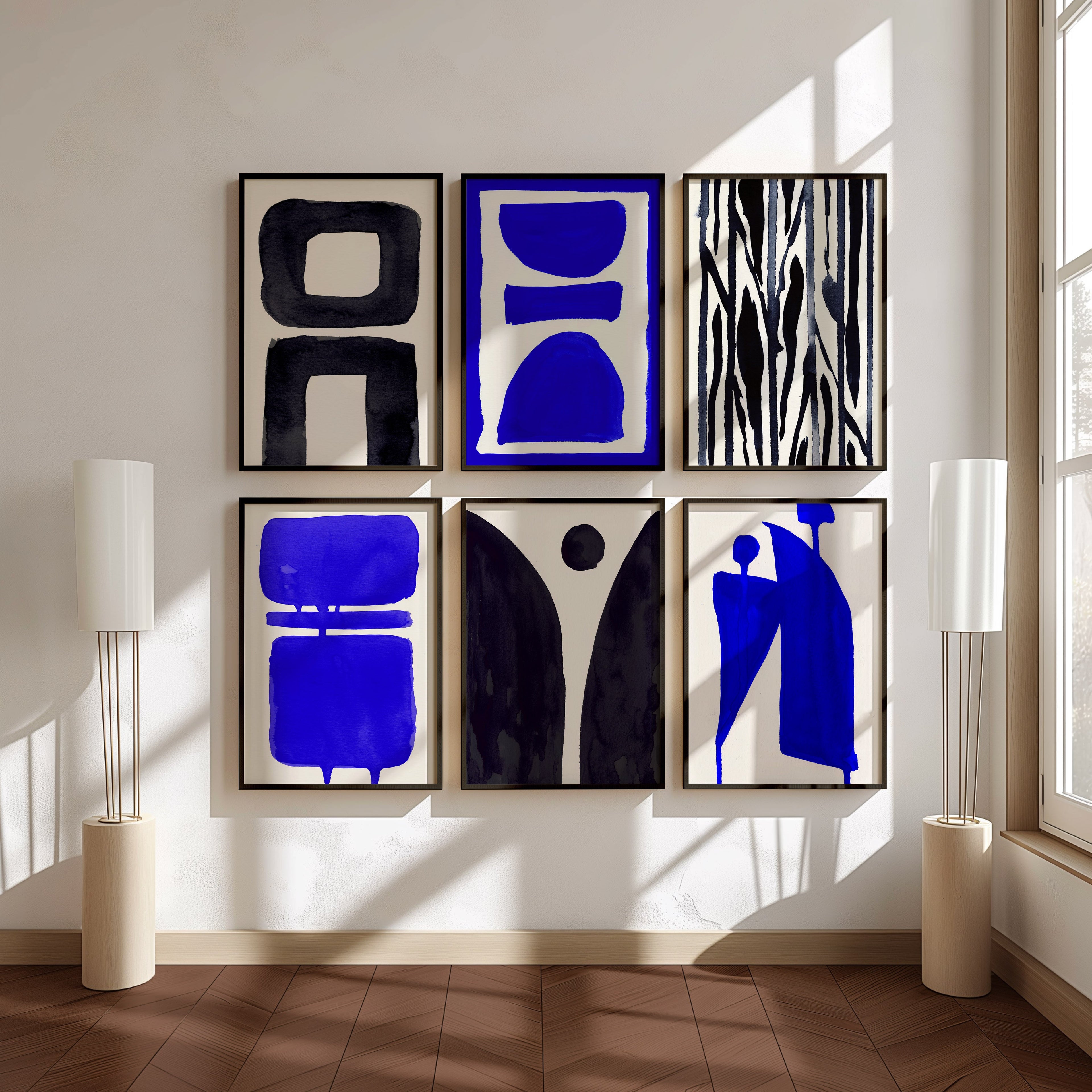 Minimalist abstract ink prints in black and blue from the Studies in Ink collection by Open Wall Studio, displayed as contemporary framed wall art.