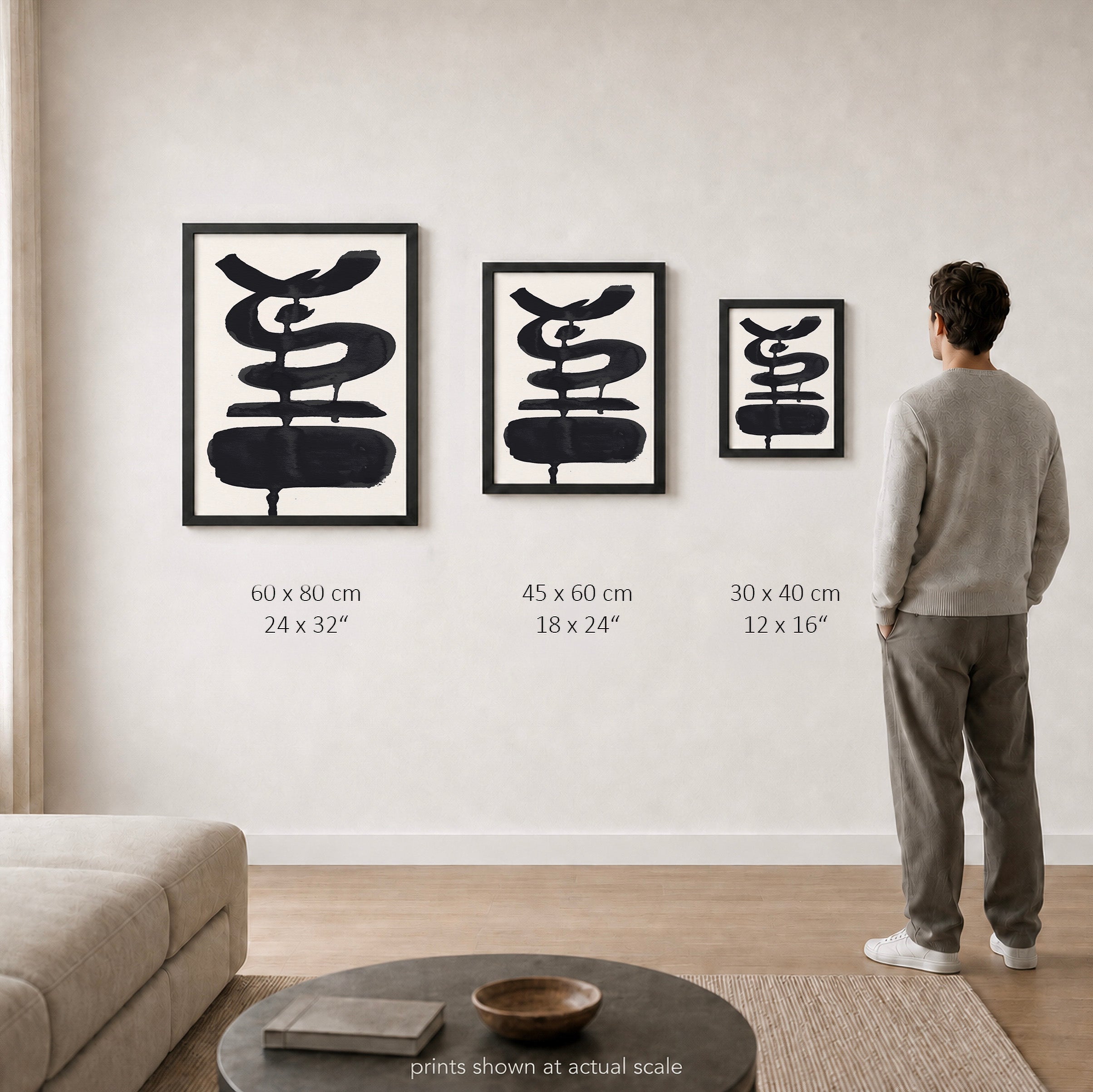 Ink Composition 19 black ink print shown to scale in a living room, all sizes.