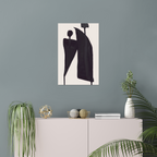Vertical abstract wall art print displayed in minimalist living room interior