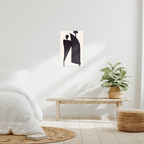 Contemporary abstract wall art print above bed in modern bedroom