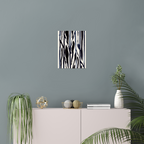 Vertical abstract wall art print displayed in minimalist living room interior