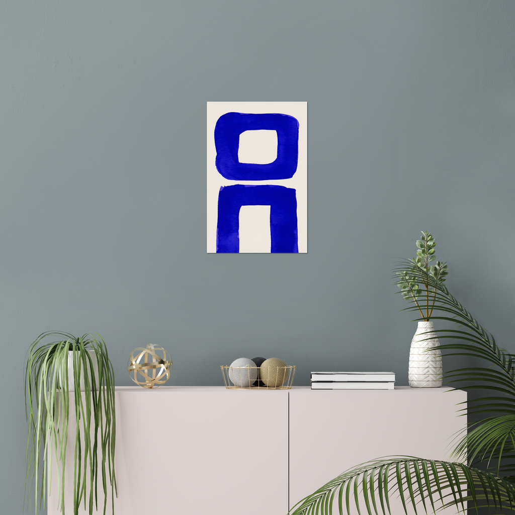 Vertical abstract wall art print displayed in minimalist living room interior