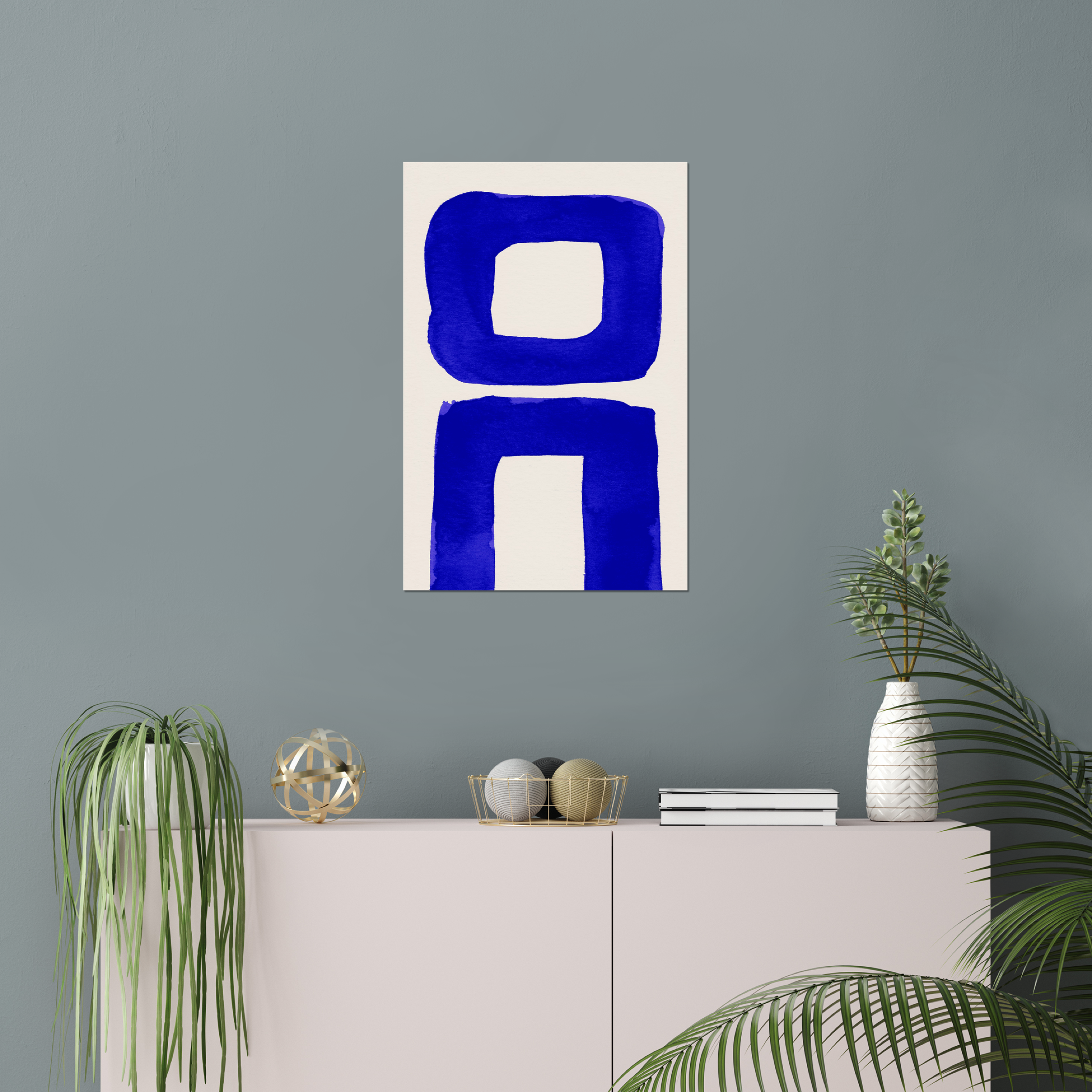 Vertical abstract wall art print displayed in minimalist living room interior