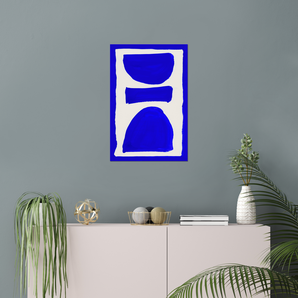 Vertical abstract wall art print displayed in minimalist living room interior