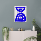 Vertical abstract wall art print displayed in minimalist living room interior