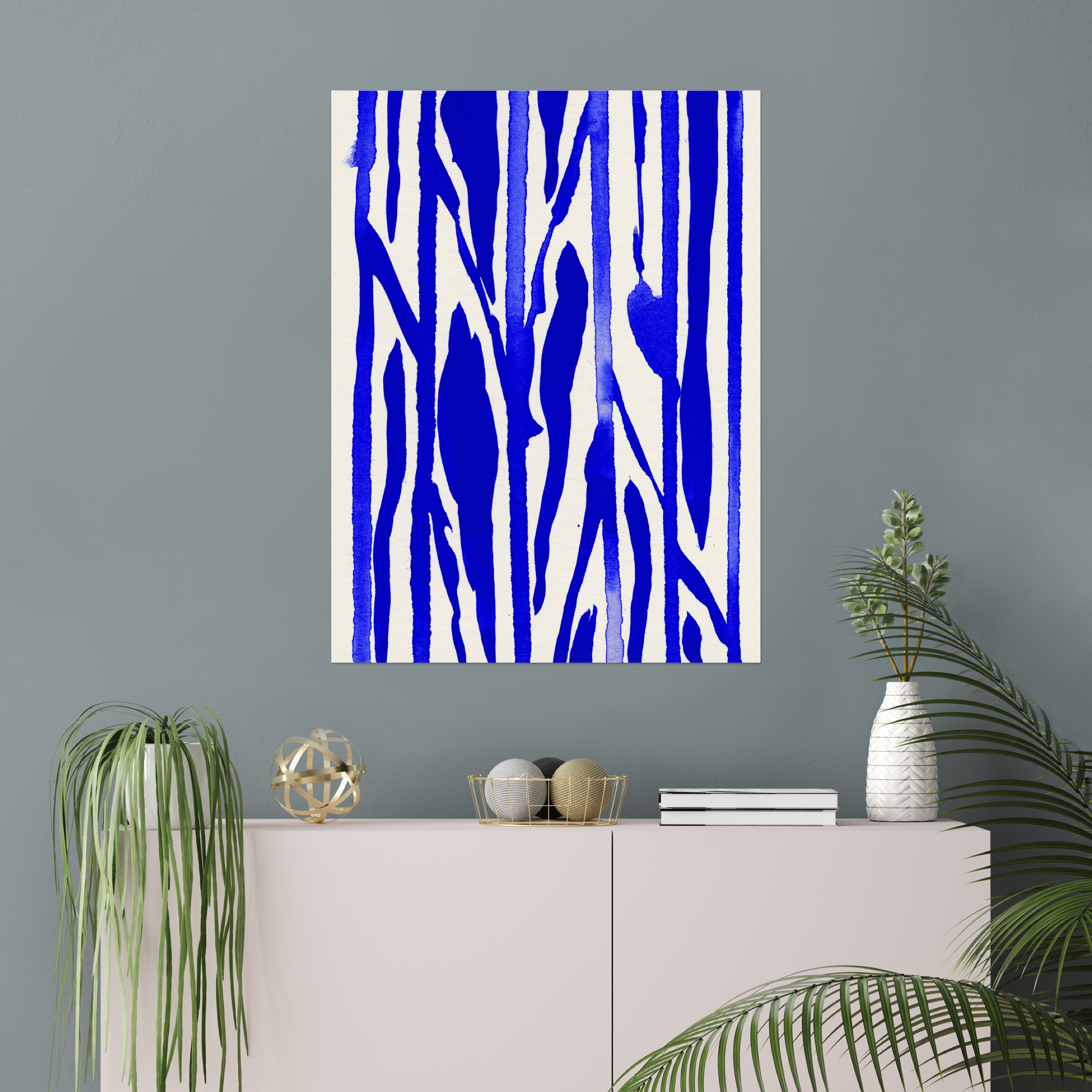 Vertical abstract wall art print displayed in minimalist living room interior