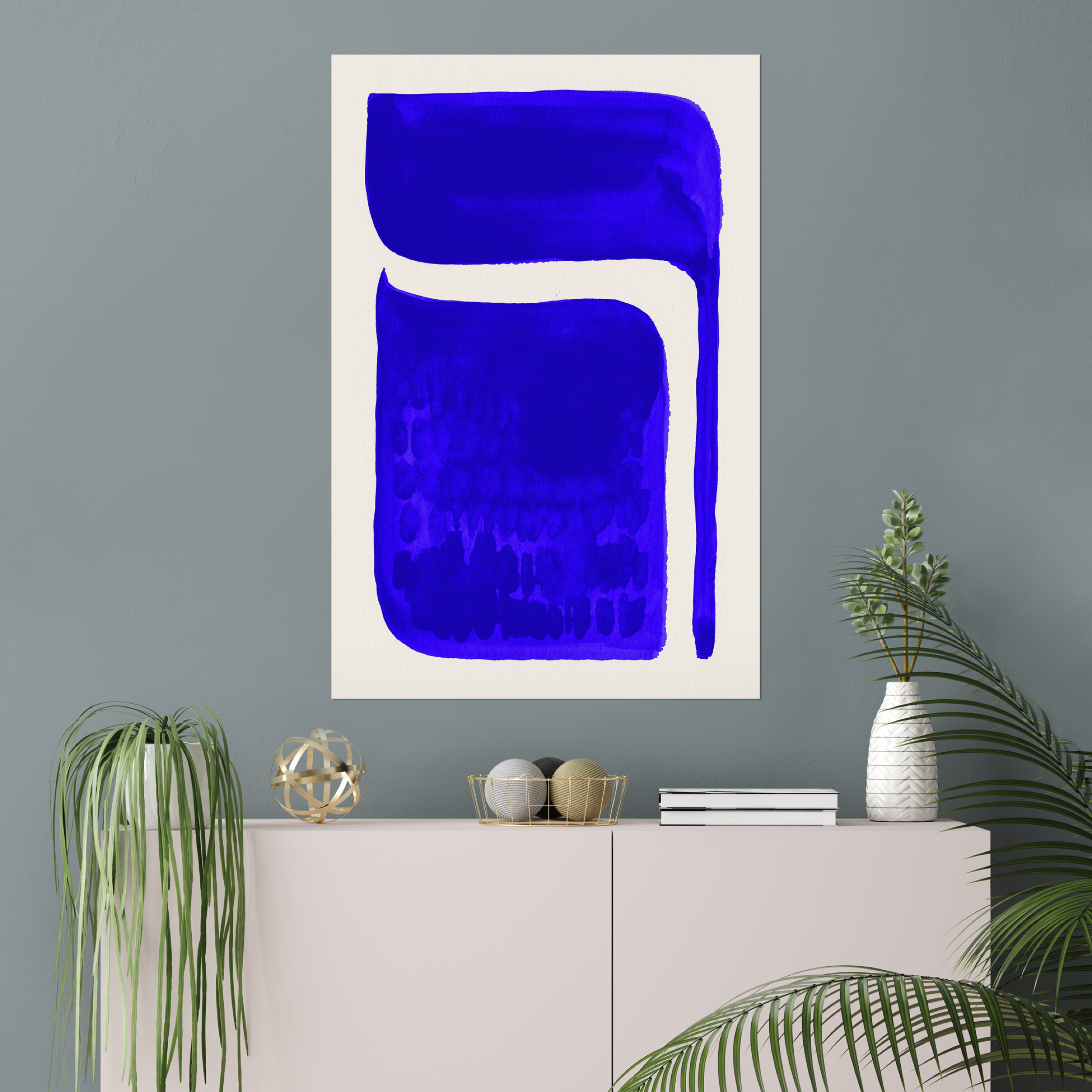 Vertical abstract wall art print displayed in minimalist living room interior