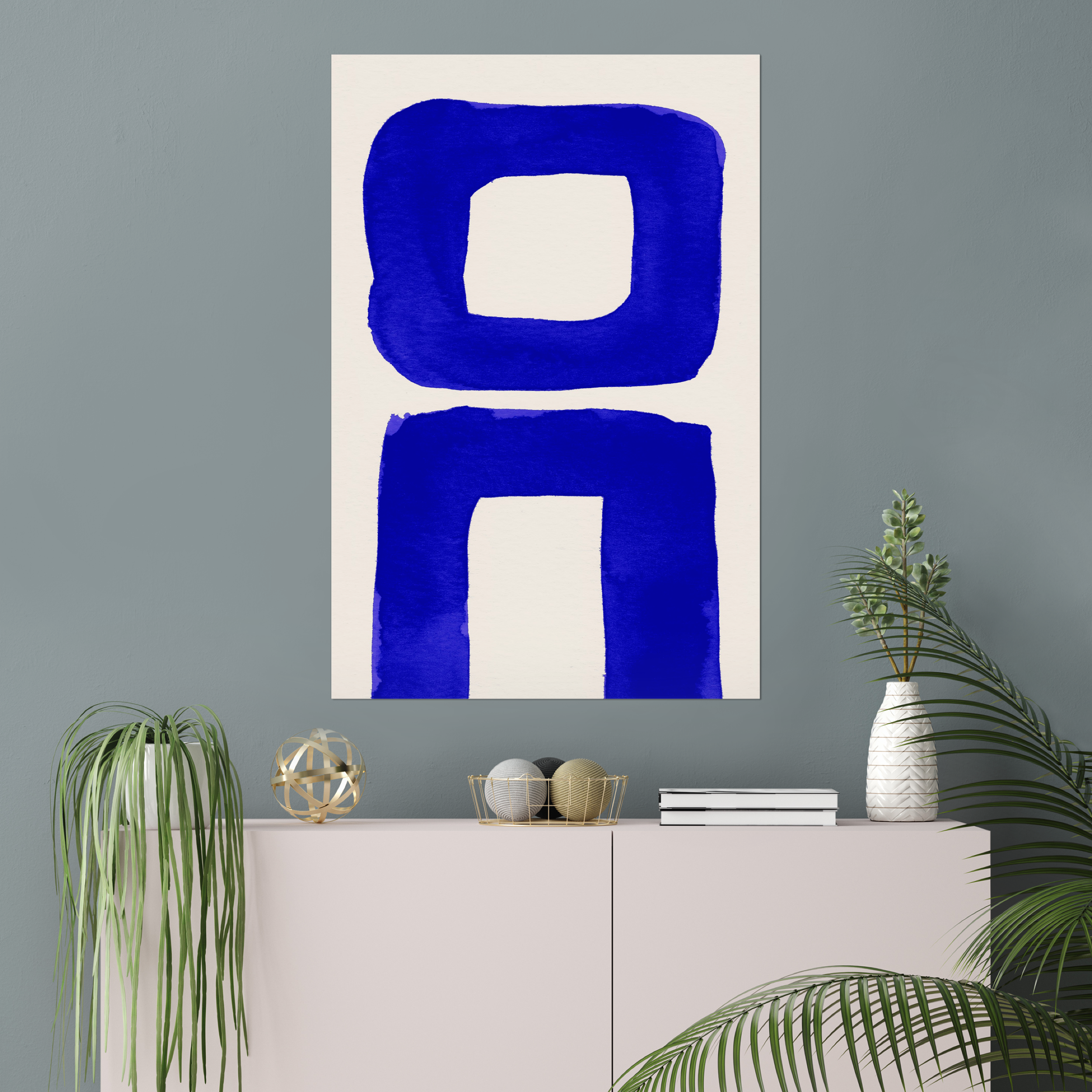 Vertical abstract wall art print displayed in minimalist living room interior